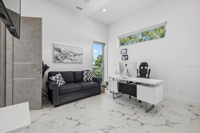 4035 Bay Shore Rd, Sarasota, FL 34234 - home office with light marble finish floors, a high ceiling, and recessed lighting