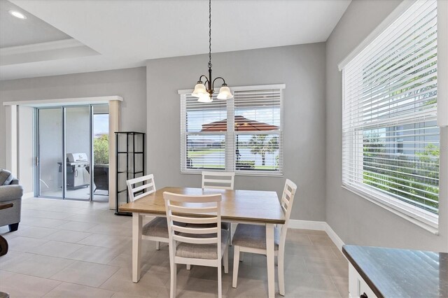 13549 Old Creek Ct, Parrish, FL 34219 - dining area with a chandelier, plenty of natural light, light tile patterned floors, baseboards, and recessed lighting