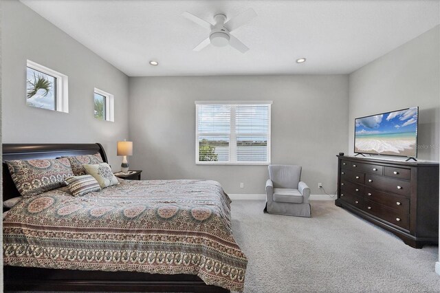 13549 Old Creek Ct, Parrish, FL 34219 - bedroom featuring carpet, multiple windows, baseboards, recessed lighting, and ceiling fan