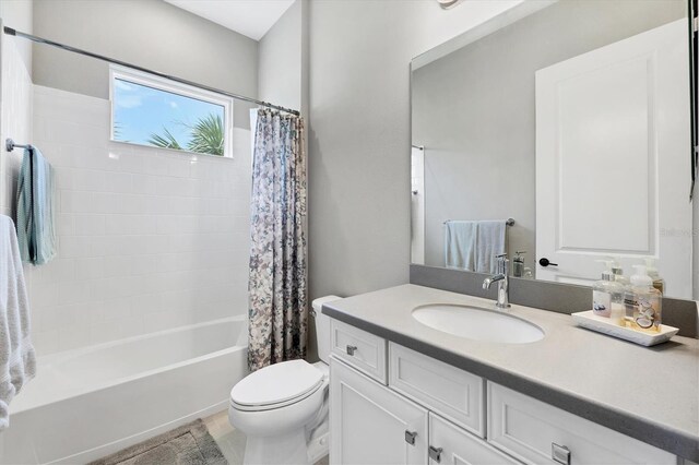 13549 Old Creek Ct, Parrish, FL 34219 - full bathroom with vanity, toilet, and shower / bath combination with curtain