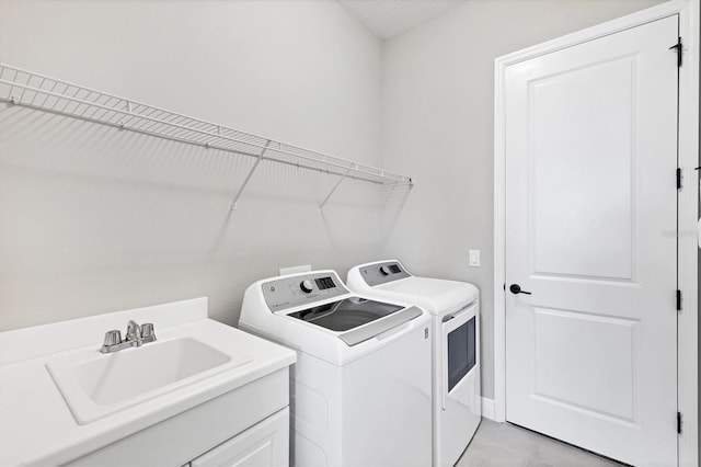 13549 Old Creek Ct, Parrish, FL 34219 - washroom featuring washing machine and clothes dryer and baseboards