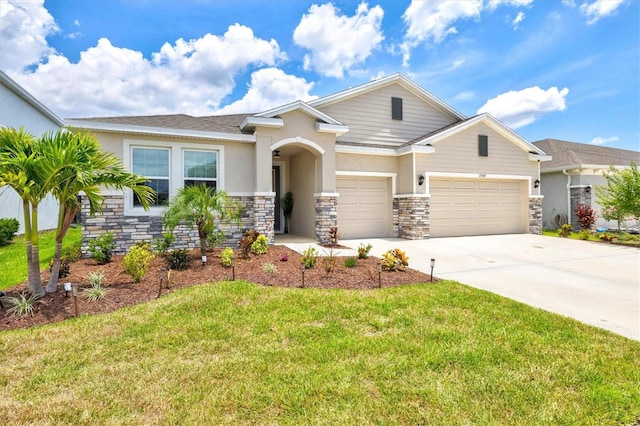 17547 Cantarina Cv, Bradenton, FL 34211 - view of front facade featuring a garage, driveway, stucco siding, and a front lawn