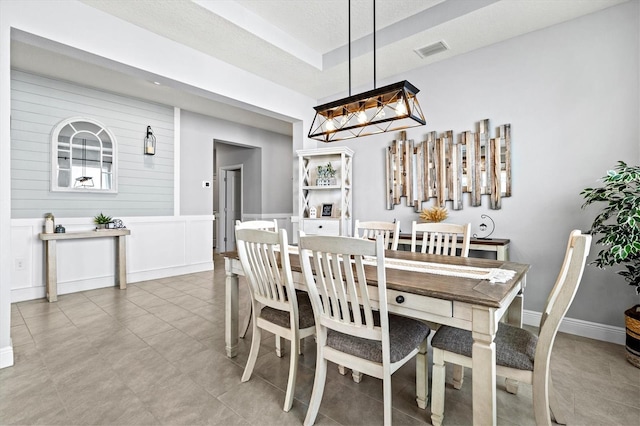 17547 Cantarina Cv, Bradenton, FL 34211 - dining space with a chandelier and tile patterned flooring