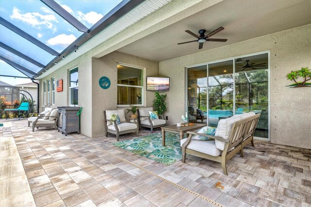 17547 Cantarina Cv, Bradenton, FL 34211 - view of patio / terrace with a ceiling fan, outdoor lounge area, and a lanai