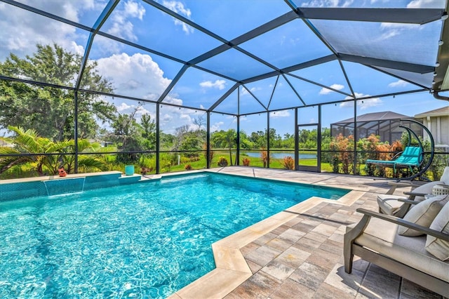 17547 Cantarina Cv, Bradenton, FL 34211 - outdoor pool with a patio and a water view