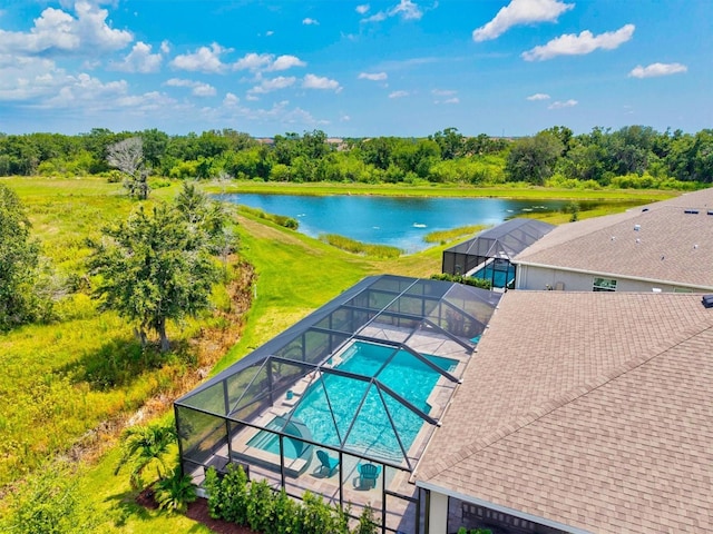 17547 Cantarina Cv, Bradenton, FL 34211 - outdoor pool with glass enclosure, a water view, view of scattered trees, a patio, and a yard