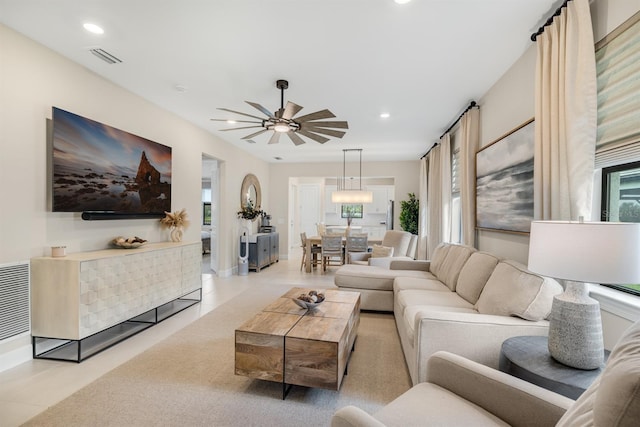 6239 Baywood Ct, Bradenton, FL 34211 - living area featuring plenty of natural light, recessed lighting, light tile patterned flooring, and ceiling fan