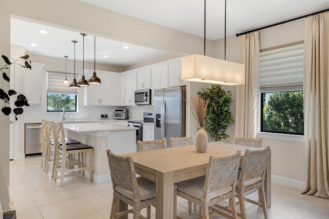 6239 Baywood Ct, Bradenton, FL 34211 - dining area featuring light tile patterned floors and recessed lighting