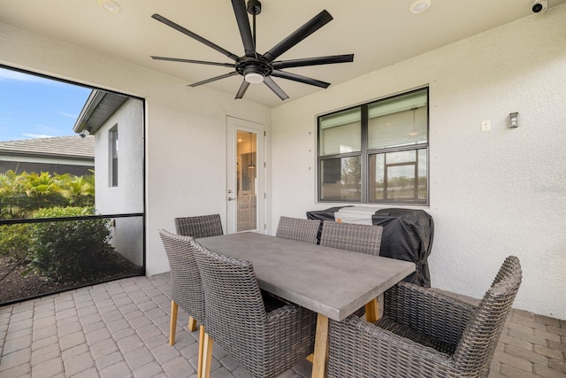 6239 Baywood Ct, Bradenton, FL 34211 - sunroom / solarium featuring a ceiling fan and outdoor dining area