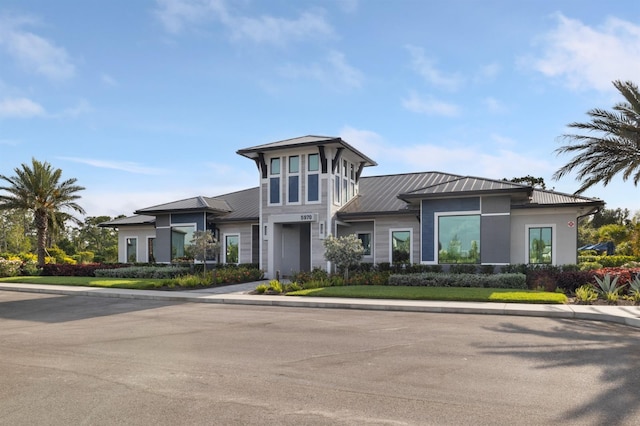 6239 Baywood Ct, Bradenton, FL 34211 - view of front of house with a standing seam roof and a metal roof