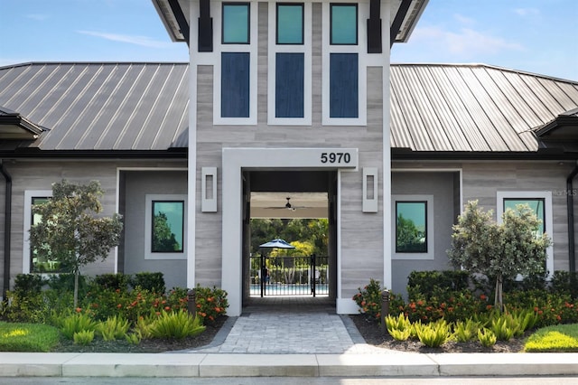 6239 Baywood Ct, Bradenton, FL 34211 - view of exterior entry with a metal roof and a standing seam roof