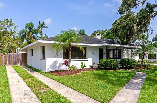 326 25th St W, Bradenton, FL 34205 - view of front of property featuring a chimney