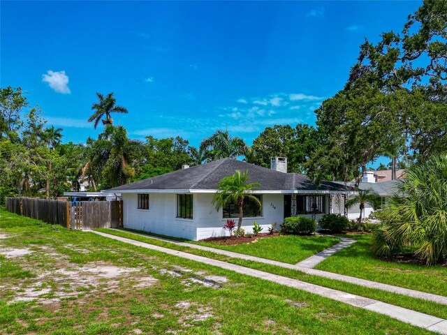 326 25th St W, Bradenton, FL 34205 - ranch-style house featuring a chimney