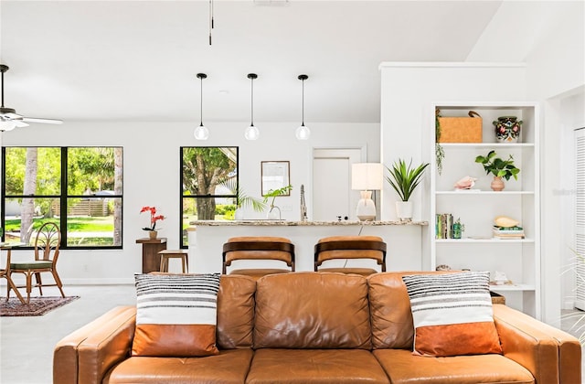 4253 Prairie View Dr, Sarasota, FL 34232 - living area featuring ceiling fan and baseboards