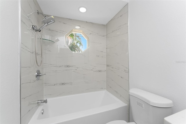 10055 Franklin Dr, Englewood, FL 34224 - bathroom featuring toilet and washtub / shower combination