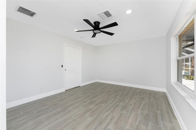 10055 Franklin Dr, Englewood, FL 34224 - empty room featuring baseboards, a ceiling fan, light wood-type flooring, and recessed lighting
