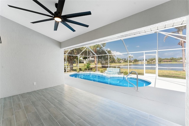 10055 Franklin Dr, Englewood, FL 34224 - swimming pool with a patio area, a water view, ceiling fan, and glass enclosure