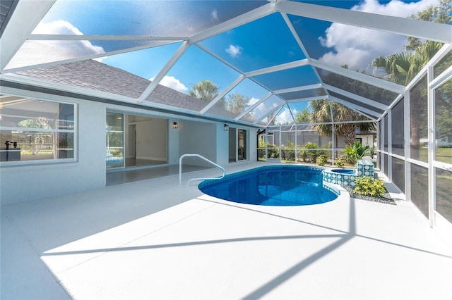 10055 Franklin Dr, Englewood, FL 34224 - view of pool with a patio area, a pool with connected hot tub, and glass enclosure