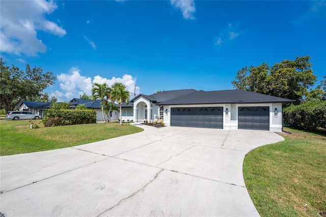 10055 Franklin Dr, Englewood, FL 34224 - single story home with an attached garage, a front lawn, driveway, and stucco siding