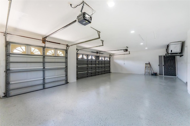 10055 Franklin Dr, Englewood, FL 34224 - garage featuring a garage door opener