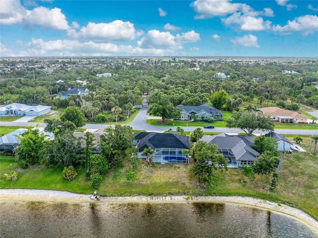 10055 Franklin Dr, Englewood, FL 34224 - aerial view of residential area with a nearby body of water and a tree filled landscape