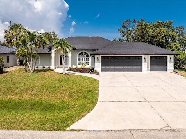 10055 Franklin Dr, Englewood, FL 34224 - single story home featuring an attached garage, driveway, a front lawn, stucco siding, and roof with shingles