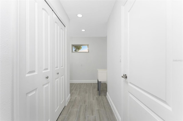 10055 Franklin Dr, Englewood, FL 34224 - hall with baseboards, recessed lighting, and light wood finished floors