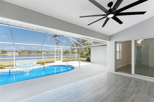 10055 Franklin Dr, Englewood, FL 34224 - outdoor pool with ceiling fan, a patio, a water view, and a lanai
