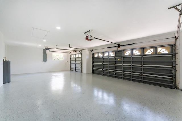 10055 Franklin Dr, Englewood, FL 34224 - garage featuring electric panel and a garage door opener