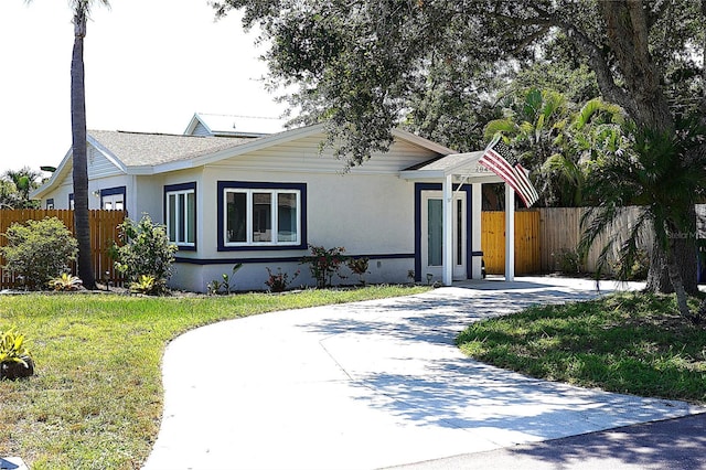 204 36th St W, Bradenton, FL 34205 - view of front of house featuring driveway and stucco siding