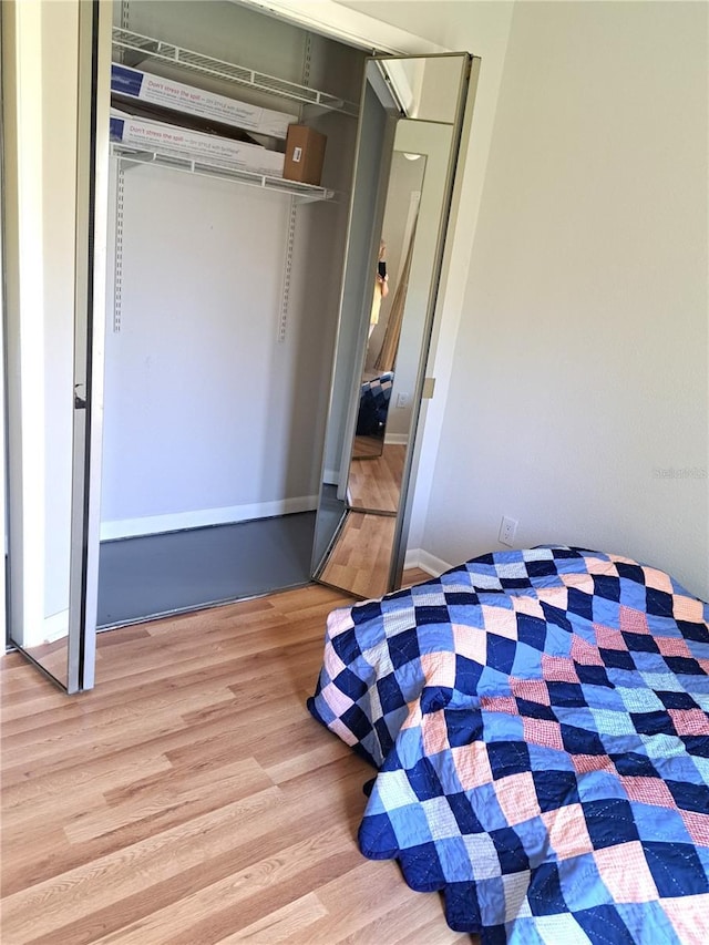 204 36th St W, Bradenton, FL 34205 - bedroom featuring wood finished floors and a closet