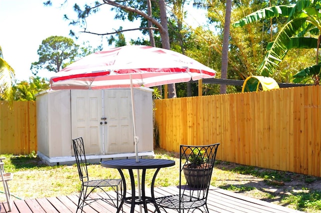 204 36th St W, Bradenton, FL 34205 - wooden terrace with a fenced backyard