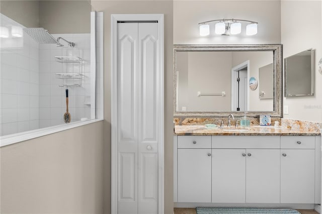 5047 Newport News Cir, Bradenton, FL 34211 - full bath featuring a closet, tiled shower, and vanity