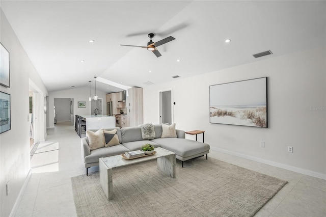 1527 Buoy Ln, Osprey, FL 34229 - living room featuring lofted ceiling, light tile patterned floors, ceiling fan, baseboards, and recessed lighting