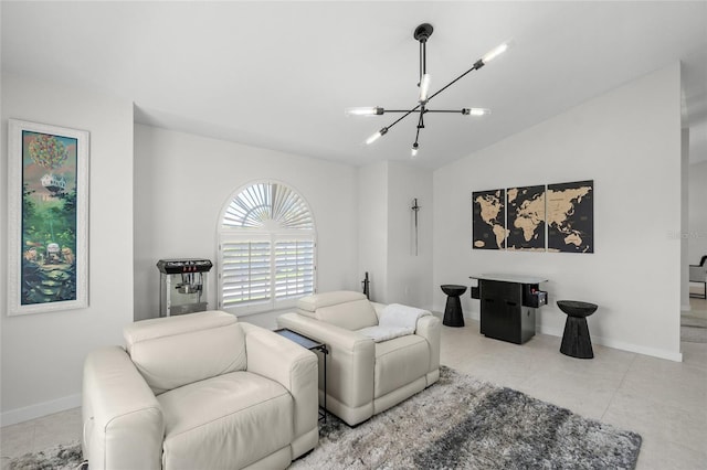 1527 Buoy Ln, Osprey, FL 34229 - living room with a chandelier, lofted ceiling, baseboards, and tile patterned flooring