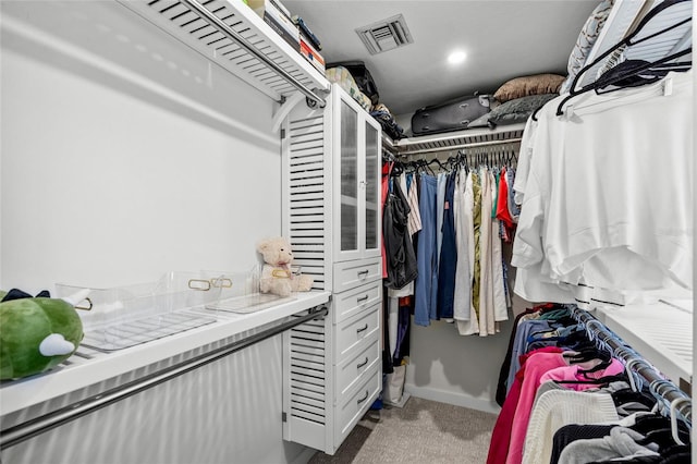 1527 Buoy Ln, Osprey, FL 34229 - walk in closet featuring carpet floors