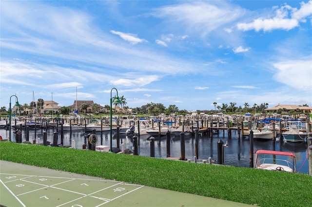 1527 Buoy Ln, Osprey, FL 34229 - dock area with a water view, a lawn, and view of marina