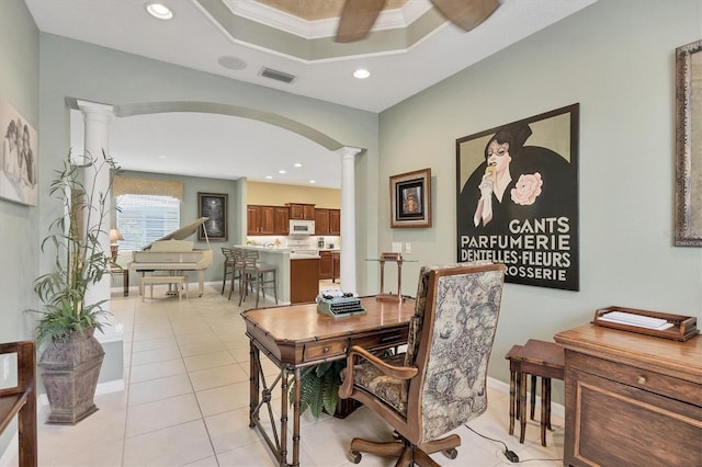 4121 Reflections Pkwy, Sarasota, FL 34233 - office area featuring ornate columns, recessed lighting, light tile patterned flooring, arched walkways, and ornamental molding