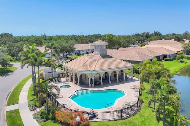 4121 Reflections Pkwy, Sarasota, FL 34233 - community pool featuring a community hot tub and a patio area