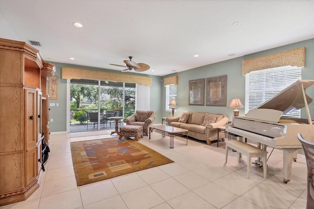 4121 Reflections Pkwy, Sarasota, FL 34233 - living room featuring ceiling fan, recessed lighting, and light tile patterned flooring