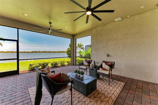 501 Maraviya Blvd, Nokomis, FL 34275 - sunroom with a water view, a ceiling fan, and healthy amount of natural light