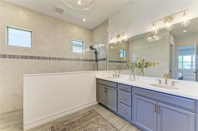 501 Maraviya Blvd, Nokomis, FL 34275 - full bathroom with a walk in shower, double vanity, and recessed lighting