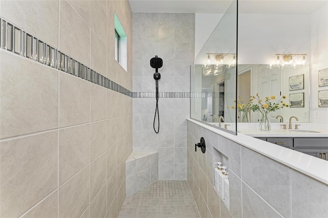 501 Maraviya Blvd, Nokomis, FL 34275 - bathroom featuring a tile shower, double vanity, and a chandelier