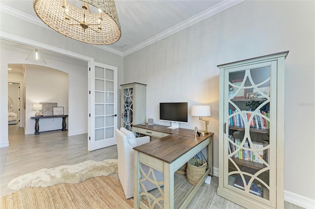 501 Maraviya Blvd, Nokomis, FL 34275 - office featuring french doors, arched walkways, wood finished floors, ornamental molding, and baseboards