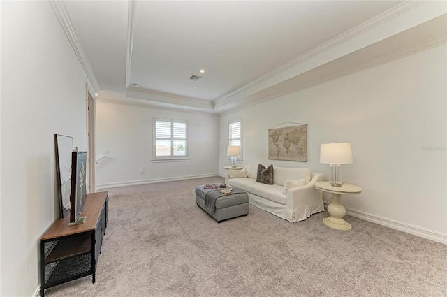 501 Maraviya Blvd, Nokomis, FL 34275 - carpeted living room featuring crown molding, a tray ceiling, and baseboards