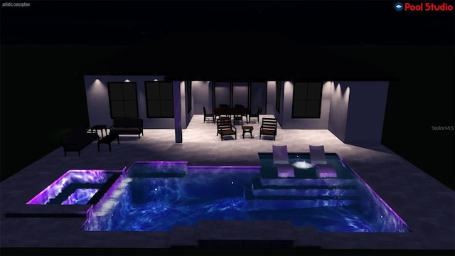 501 Maraviya Blvd, Nokomis, FL 34275 - pool at twilight featuring a pool with connected hot tub
