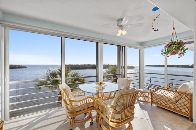 4310 Falmouth Dr Unit 307, Longboat Key, FL 34228 - sunroom with a water view and tile patterned flooring
