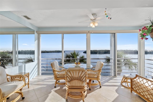4310 Falmouth Dr Unit 307, Longboat Key, FL 34228 - sunroom / solarium with tile patterned floors and a water view