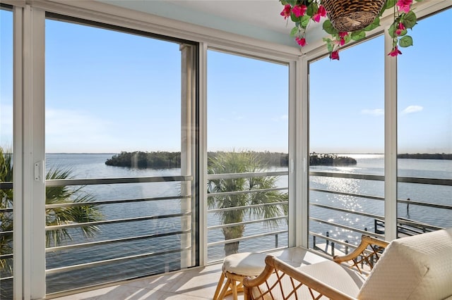 4310 Falmouth Dr Unit 307, Longboat Key, FL 34228 - sunroom / solarium with a water view