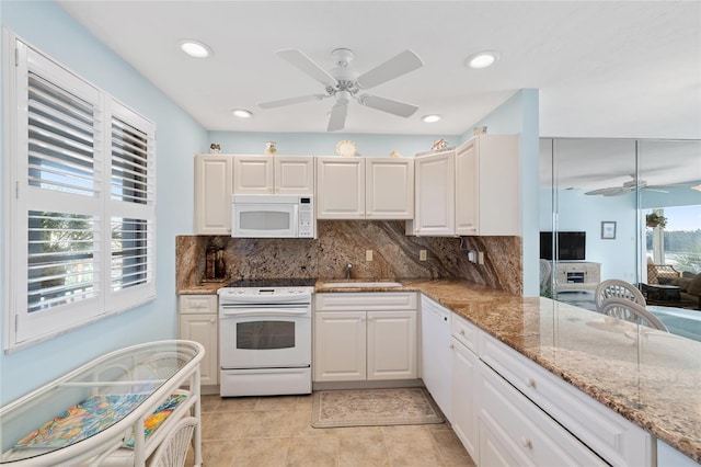 4310 Falmouth Dr Unit 307, Longboat Key, FL 34228 - kitchen with white appliances, a ceiling fan, a sink, backsplash, and recessed lighting